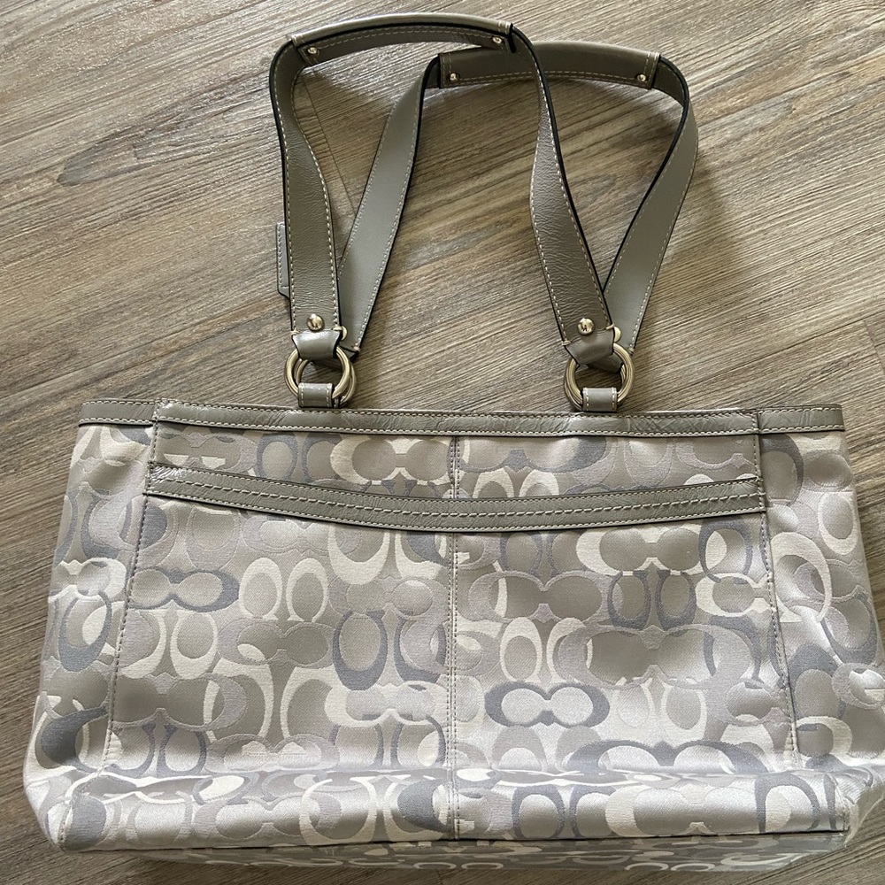 Gray/silver Coach purse